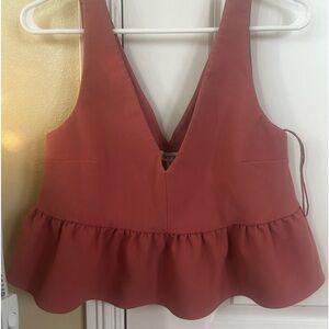 Pink top ( tight at top then flowy at bottom ) cropped